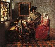 A Lady Drinking and a Gentleman wr VERMEER VAN DELFT, Jan